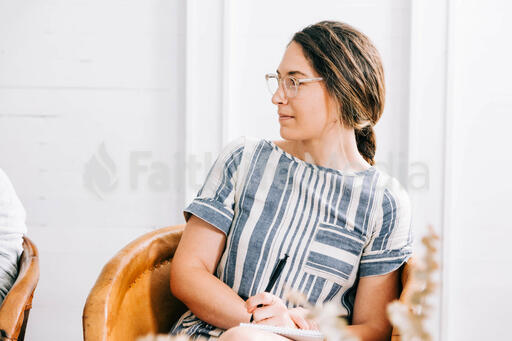 Woman Listening during Small Group Discussion