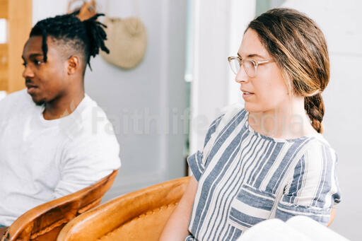 Man and Woman Listening during Small Group Discussion