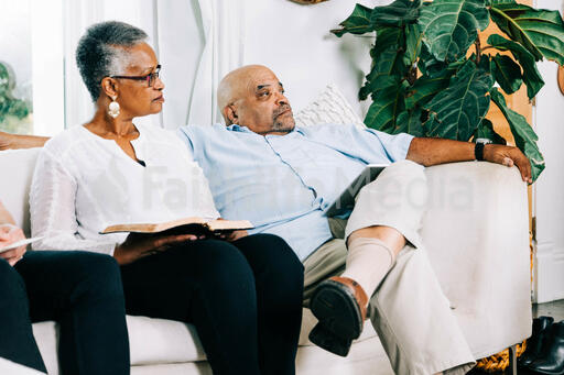 Married Couple Listening during Discussion at Small Group