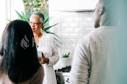 Woman having Conversation in the Kitchen