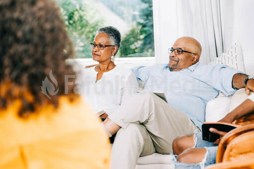 Married Couple Listening during Small Group Discussion