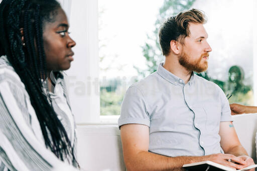 Young People at Small Group Listening during Discussion