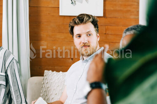 Man Listening during Small Group Discussion