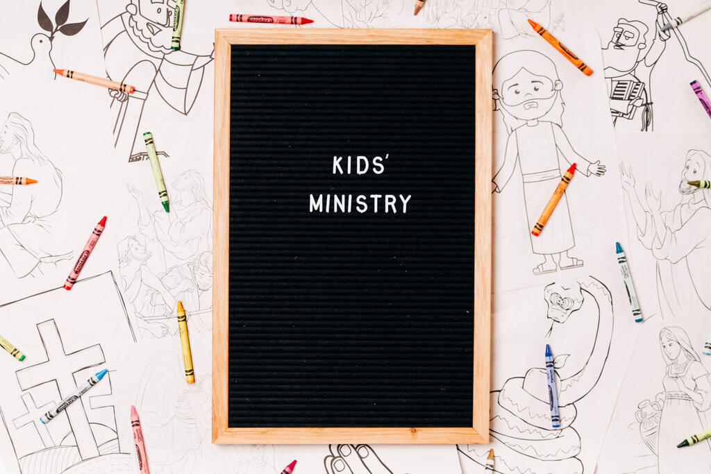 Kids' Ministry Letter Board Surrounded by Crayons and Coloring Pages large preview