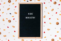 Kids' Ministry Letter Board Surrounded by Snacks  image 1