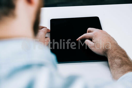 Man Using iPad