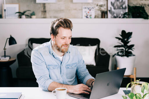 Man Working on Laptop