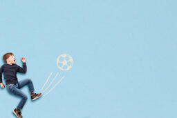 Boy Kicking Illustrated Soccer Ball  image 1
