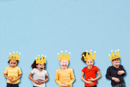 Kids Laughing with Illustrated Crowns on Their Heads  image 1