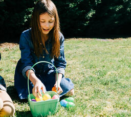 Girl Opening One of Her Easter Eggs  image 3