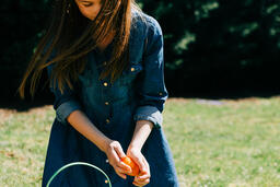 Girl Opening One of Her Easter Eggs  image 4