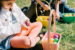 Girl Opening One of Her Easter Eggs  image 2