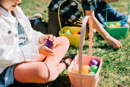 Girl Opening One of Her Easter Eggs  image 7