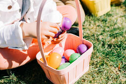 Child Finding a Piece of Candy in Her Easter Egg  image 5