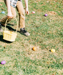 Boy Grabbing Easter Eggs  image 1