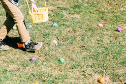 Boy Grabbing Easter Eggs  image 2