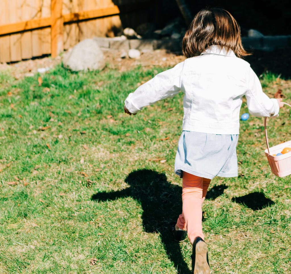 Girl Running in an Easter Egg Hunt large preview