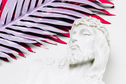 Christ Statue and Palm Leaves  image 1