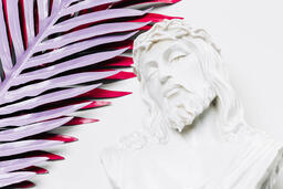 Christ Statue and Palm Leaves  image 2