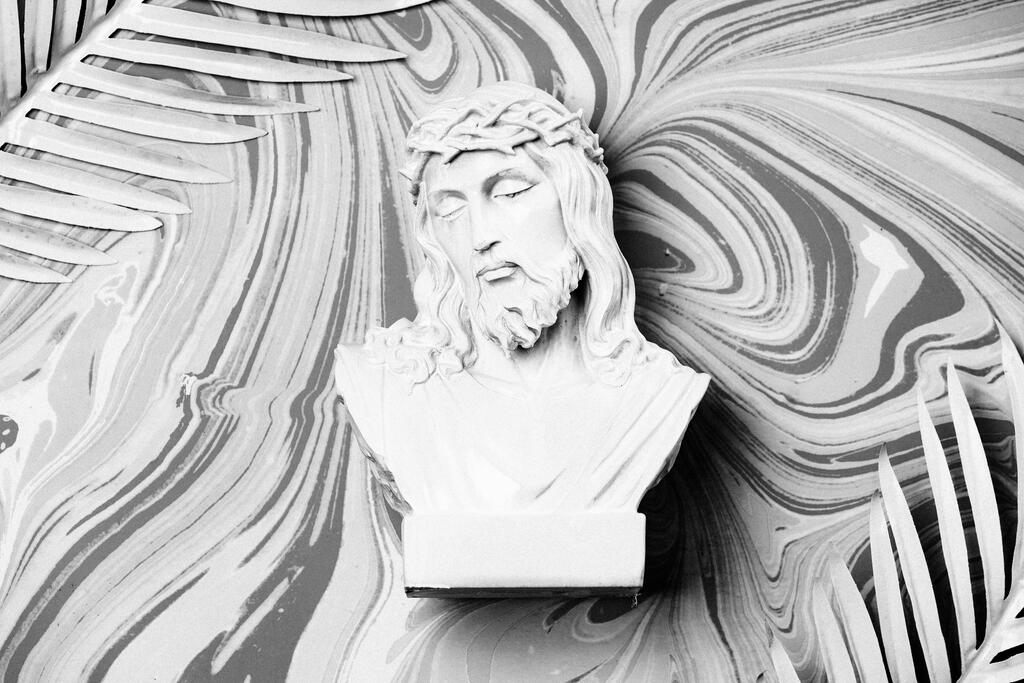 Christ Statue with Palm Leaves on Marbled Background large preview