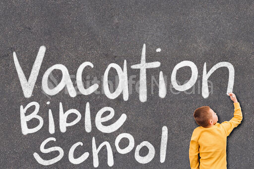 Boy Writing Vacation Bible School with Chalk