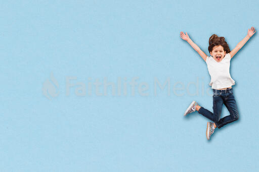 Girl Jumping and Laughing