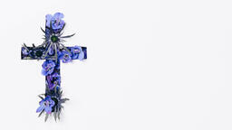 Cross with Blue Flowers Poking Through  image 1