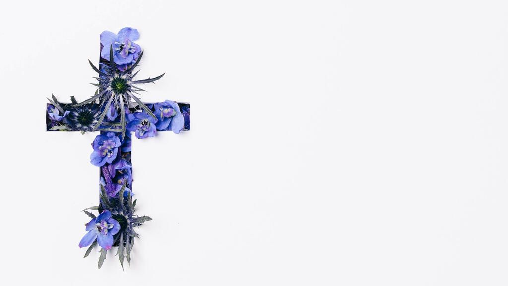 Cross with Blue Flowers Poking Through large preview