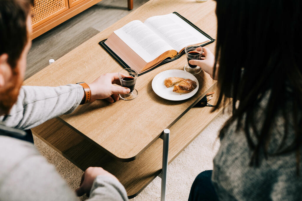 Couple Taking Communion Together at Home large preview