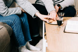 Couple Taking Communion Together at Home  image 2