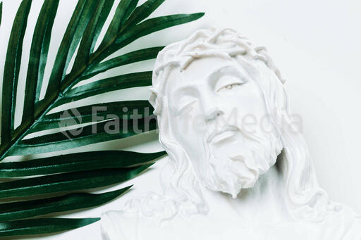 Christ Statue with Palm Leaf