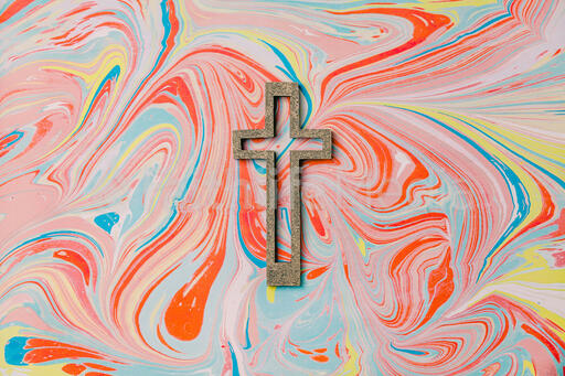 Cross on Pastel Marbled Background