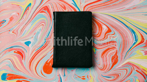 Bible on Pastel Marbled Background