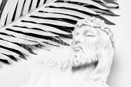 Christ Statue with Palm Leaves
