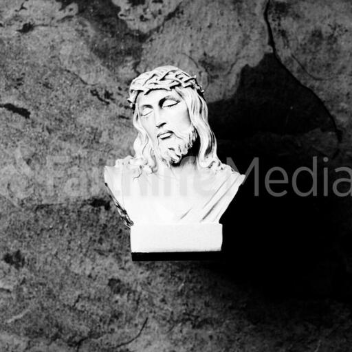 Christ Statue on Textured Background