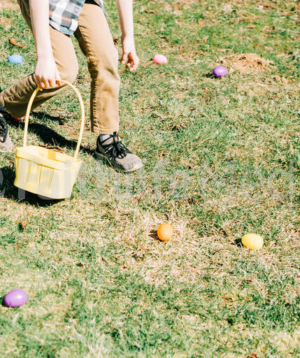 Boy Grabbing Easter Eggs