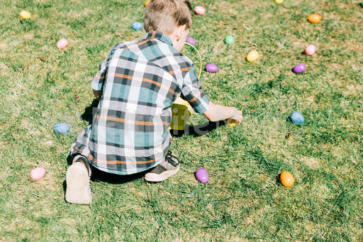 Boy Grabbing Easter Eggs