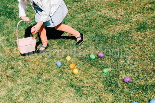 Child Grabbing an Easter Egg