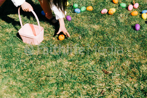 Child Grabbing an Easter Egg