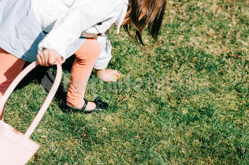 Child Finding an Easter Egg