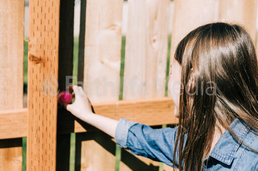 Girl Finding an Easter Egg