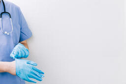 Doctor Putting Medical Gloves On  image 5