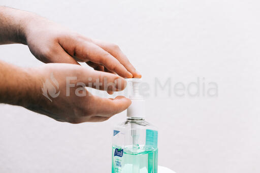 Hands Pumping Hand Sanitizer