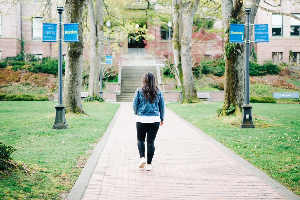 Student Walking on an Empty College Campus large preview