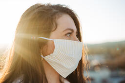 Woman Wearing a Face Mask at Sunrise  image 2