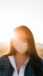 Woman Wearing a Face Mask at Sunrise  image 4