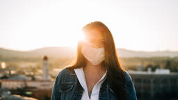 Woman Wearing a Face Mask at Sunrise  image 5