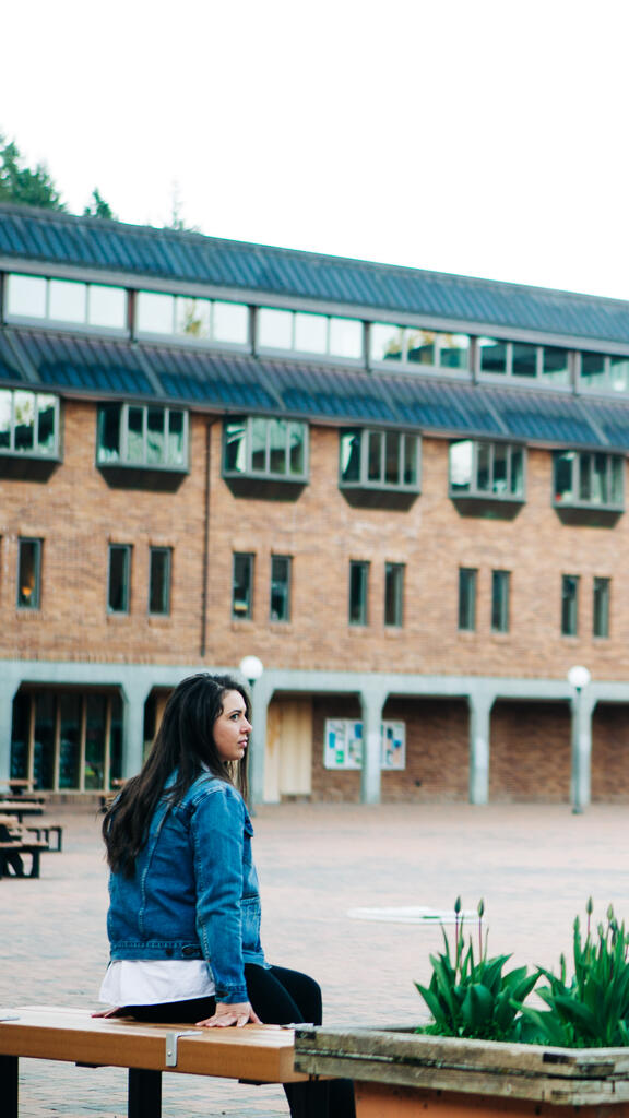 Student Sitting in an Empty College Campus large preview