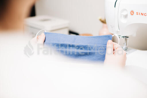 Woman Holding a Homemade Face Mask