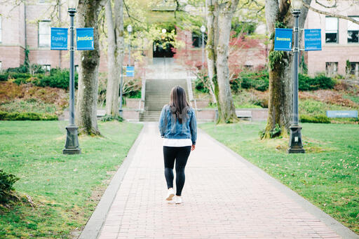 Student Walking on an Empty College Campus
